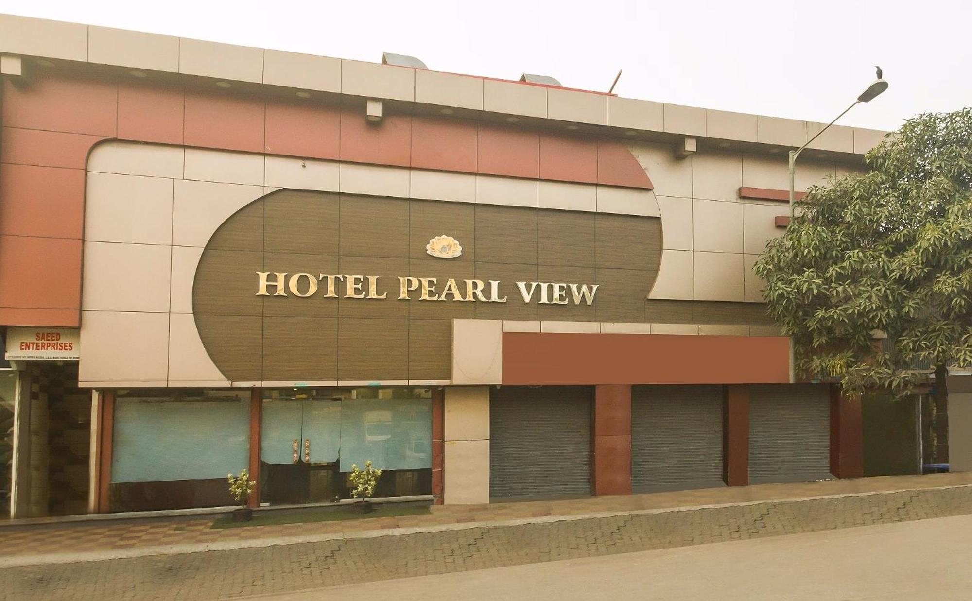 Capital O Hotel Pearl Near Us Embassy Мумбаи Экстерьер фото